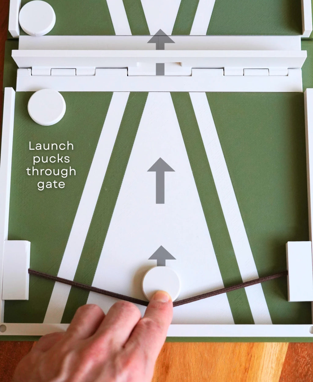 PlayBook’d Sling Puck – Actiongeladener Spielspaß im Buchformat